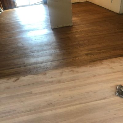 Wood floor staining in progress by Evo Wood Flooring in Leeds